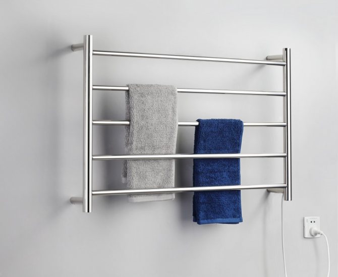 Видове релси за отопляеми кърпи за баня и техните размери