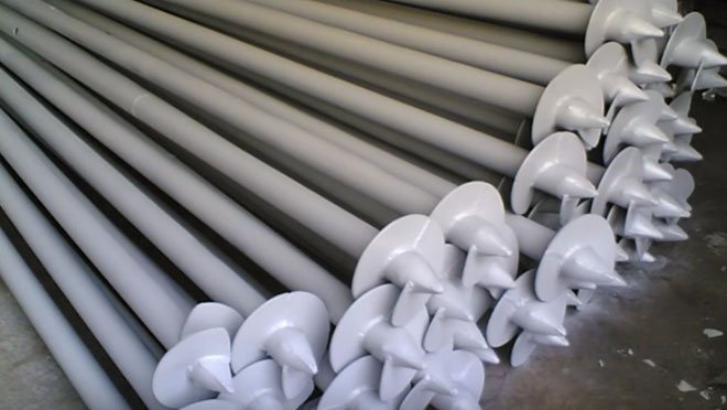 Завийте купчини за фундамент